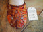 orange and silver birds and flower