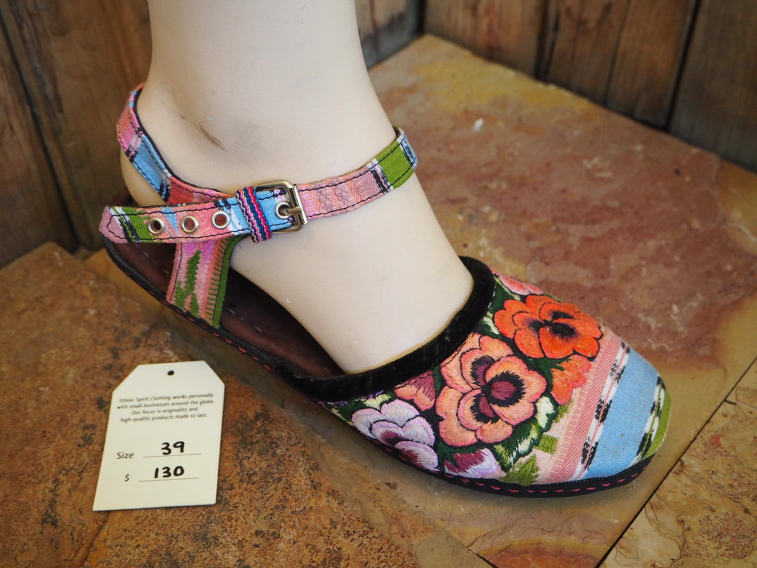 orange and pink flowers on pastel stripes