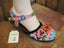 orange and pink flowers on pastel stripes