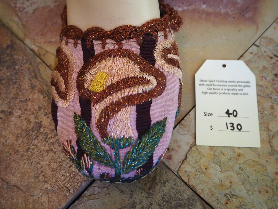 brown and tan tulip on pink and brown stripes