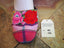 pink and red flowers on pink tartan