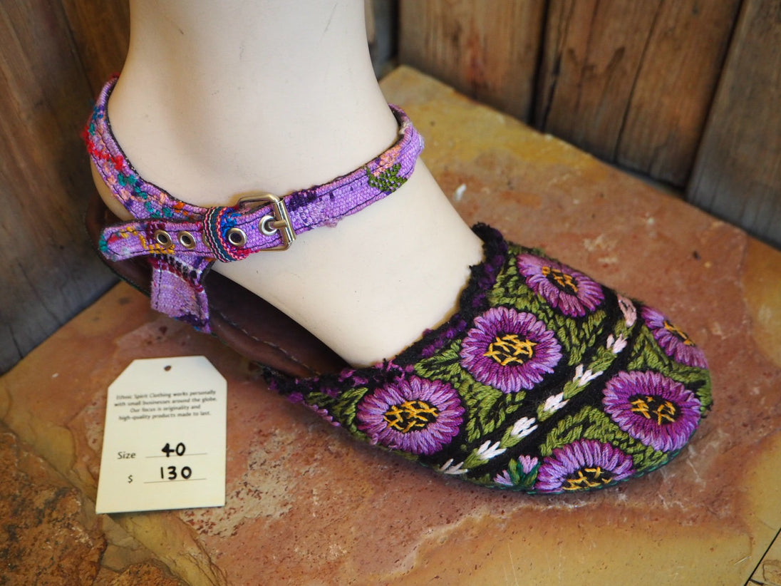 purple flowers on green follage
