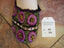 purple flowers on green follage