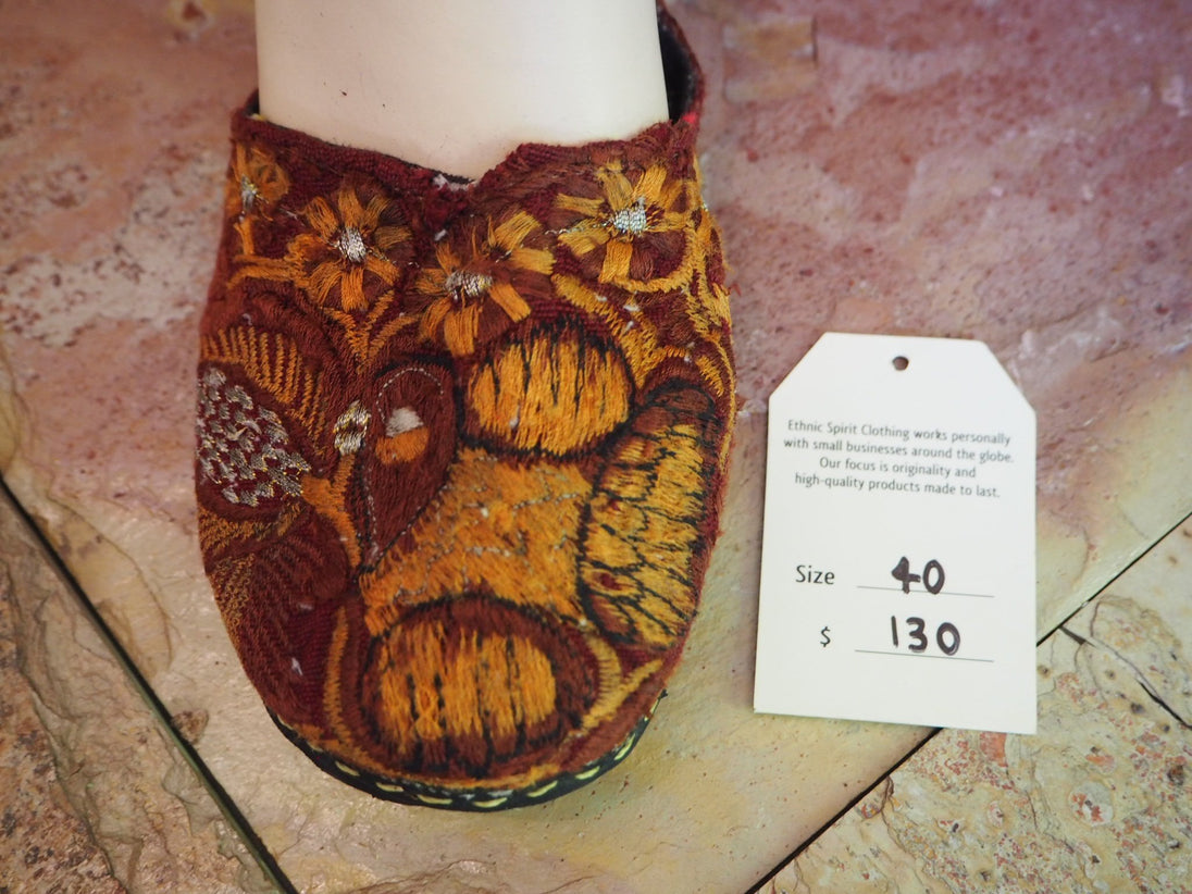 golden brown birds and flowers